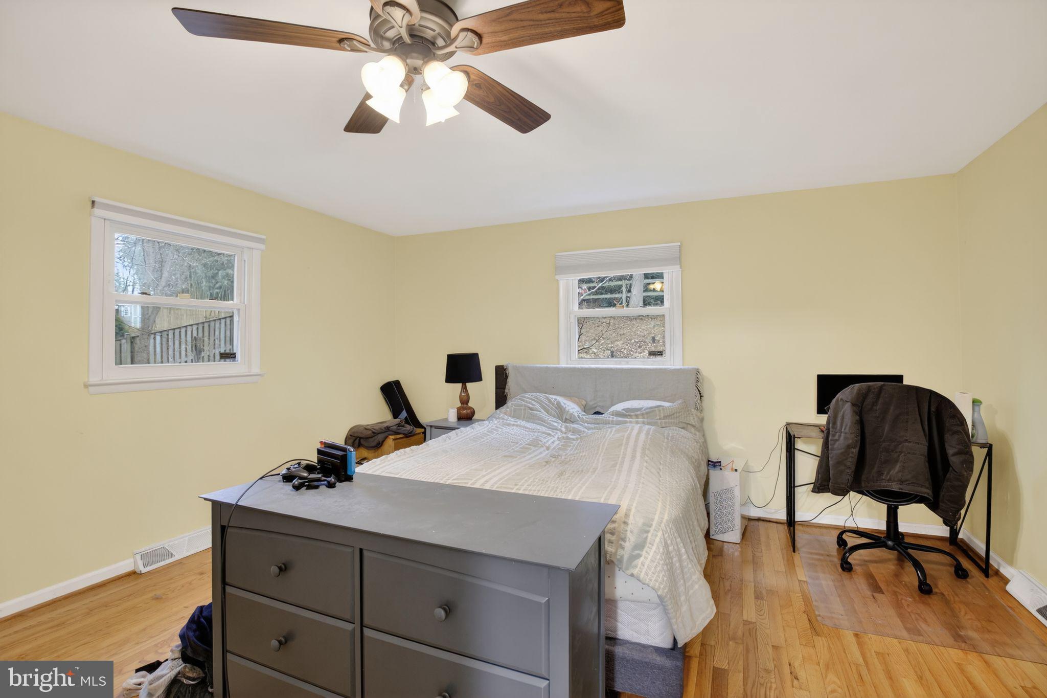 1201 North Tollgate Road Bel Air, MD 21014 - Photo 25 of 41 a bedroom with a bed and a chair