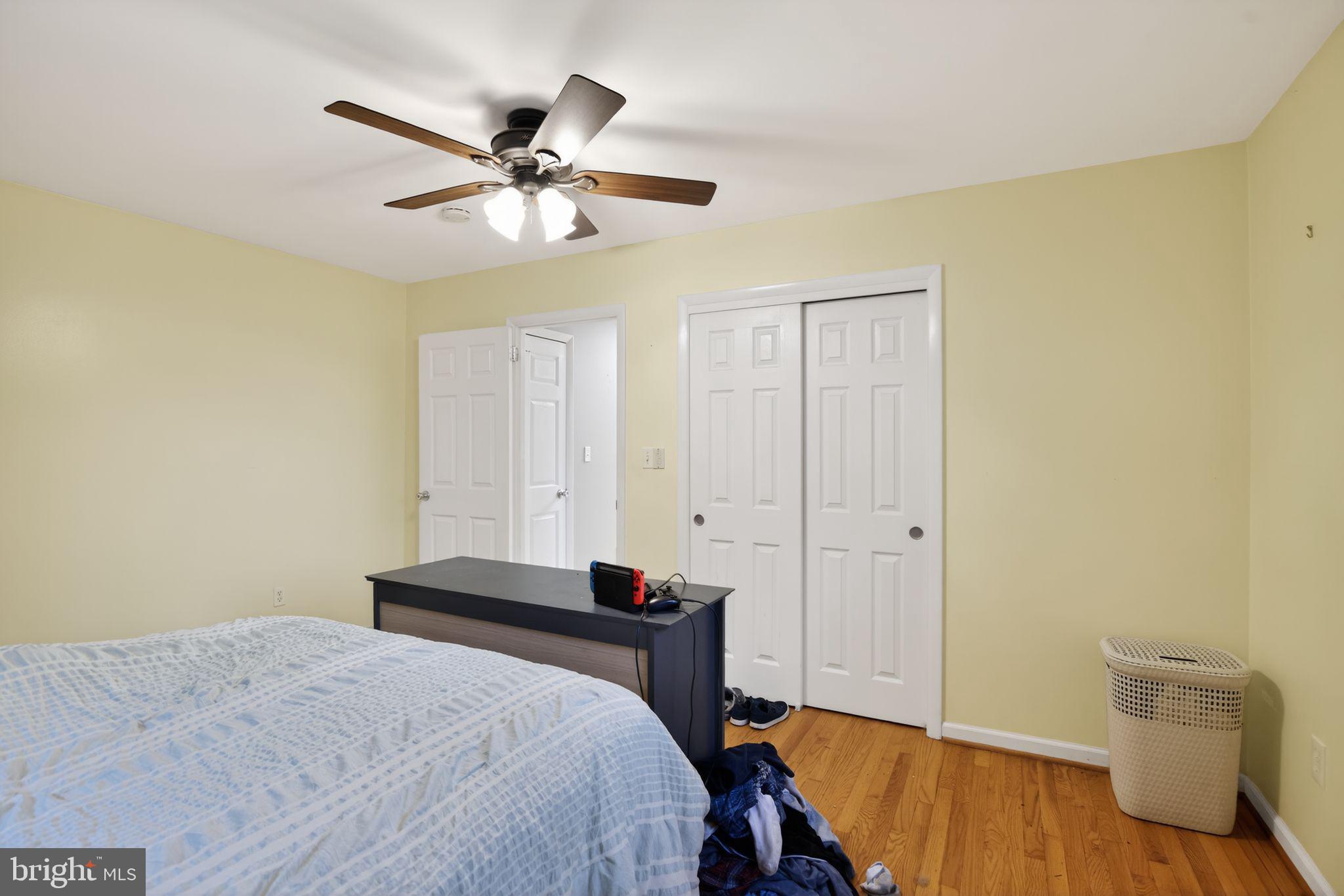 1201 North Tollgate Road Bel Air, MD 21014 - Photo 26 of 41 a bedroom with a bed and a ceiling fan