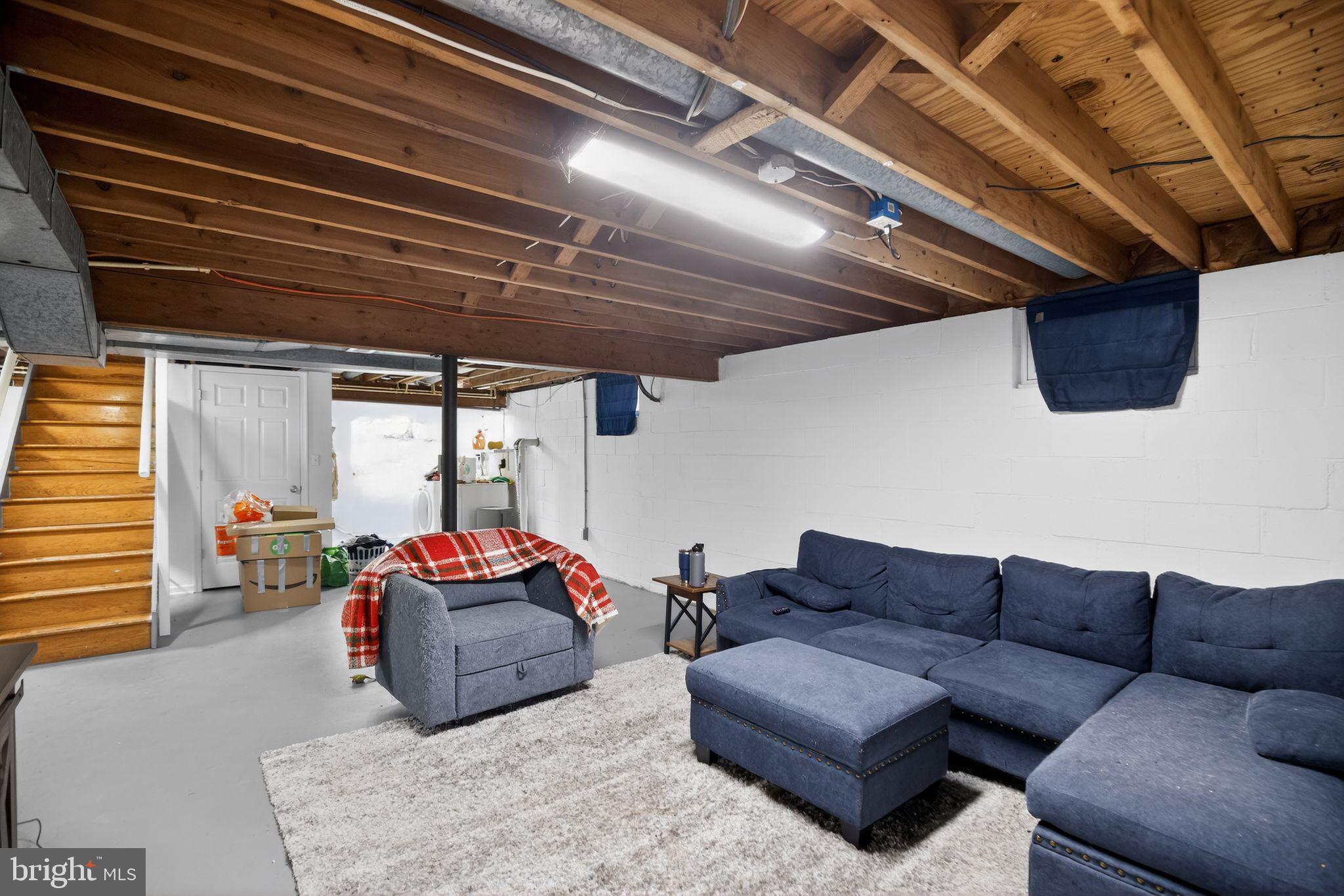 1201 North Tollgate Road Bel Air, MD 21014 - Photo 32 of 41 a living room with furniture a couch and a window