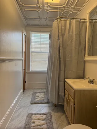 a view of a room with rack on the wall