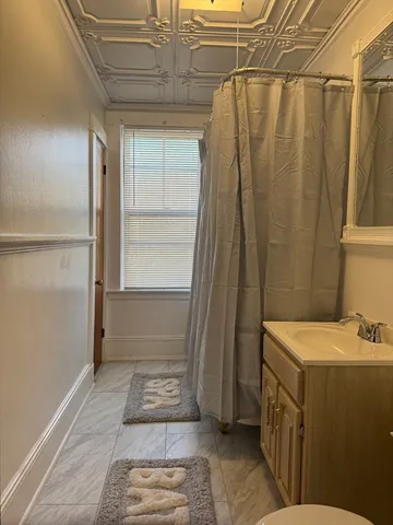 a view of a room with rack on the wall