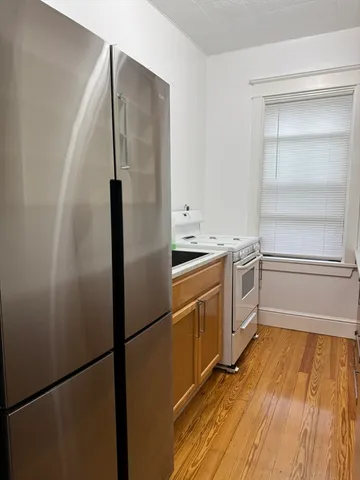 a view of a sink and a stove