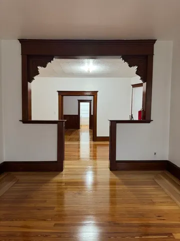 a living room with wooden floor