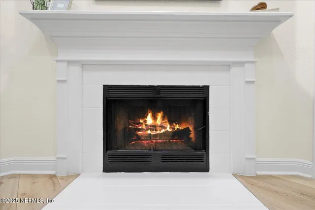 a living room with a fireplace