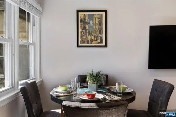 a kitchen with stainless steel appliances granite countertop a refrigerator sink and cabinets