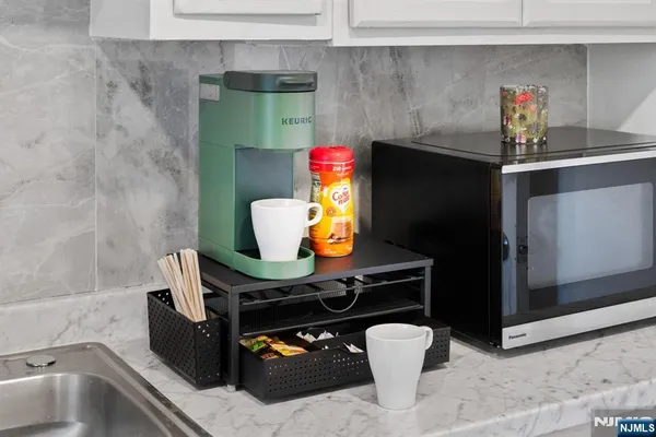 a bedroom with a bed and with windows