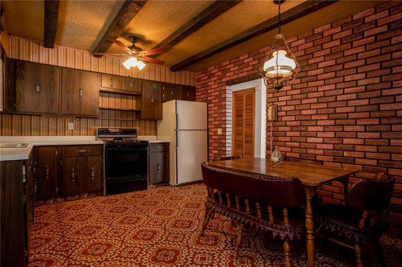 309 Stone Quarry Road Monaca, PA 15061 - Photo 2 of 12 Large eat-in kitchen with exposed beams and country look.
