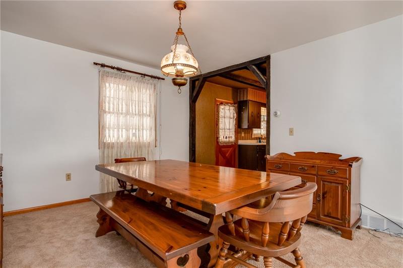 309 Stone Quarry Road Monaca, PA 15061 - Photo 4 of 12 Large opening from kitchen to dining area, that then extends to the large living room.