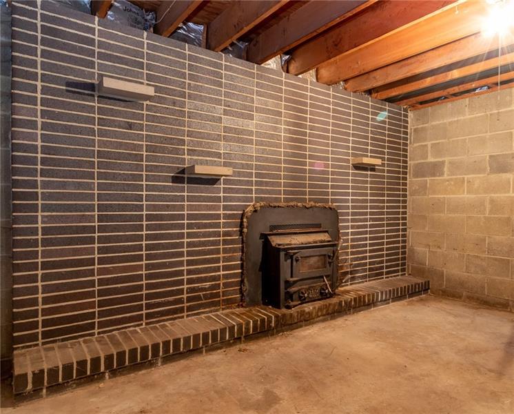 309 Stone Quarry Road Monaca, PA 15061 - Photo 10 of 12 Ready for your touches, lower level family room.