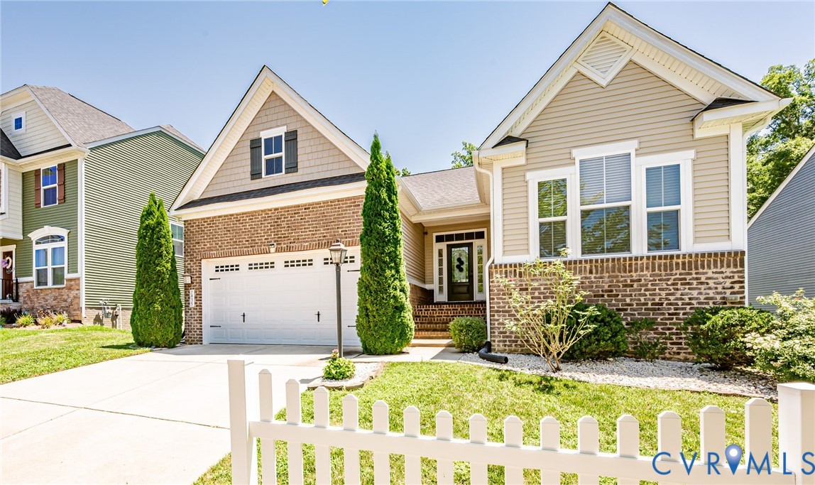 7435 Wicks Road Williamsburg, VA 23188 - Photo 1 of 82 Exterior featuring a two-car garage, brick and sid