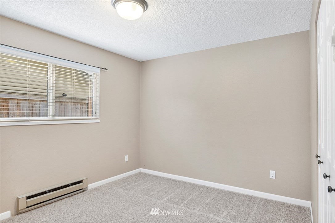 16505 23rd Avenue Southeast Bothell, WA 98012 - Photo 14 of 33 a view of an empty room with a window