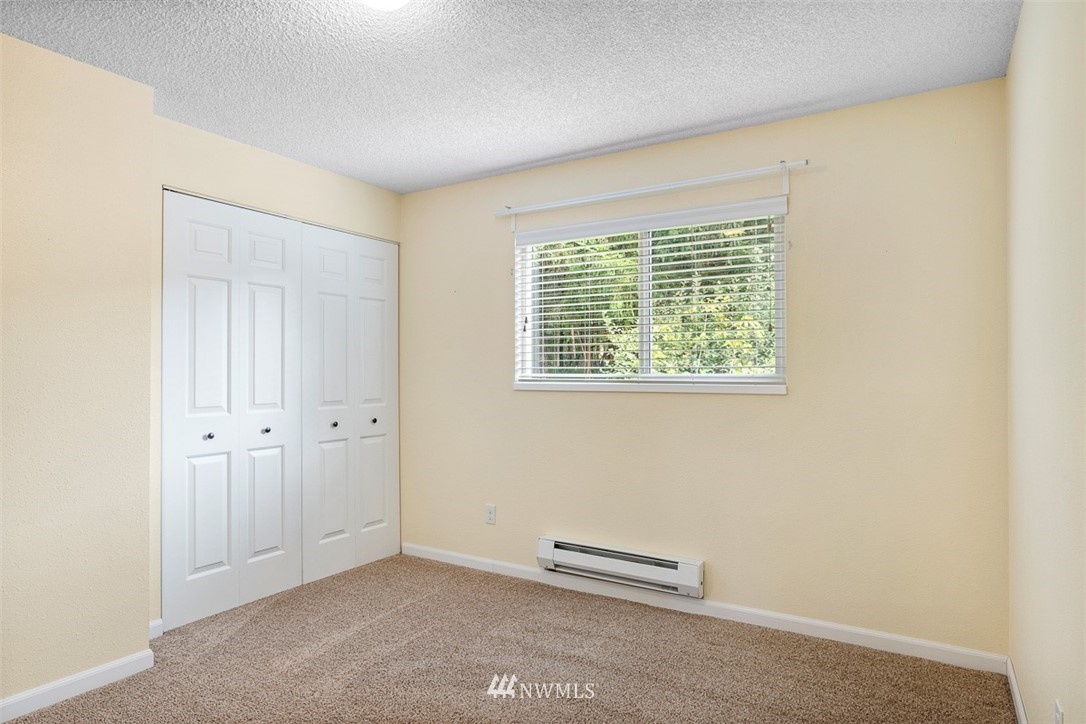 16505 23rd Avenue Southeast Bothell, WA 98012 - Photo 16 of 33 an empty room with windows
