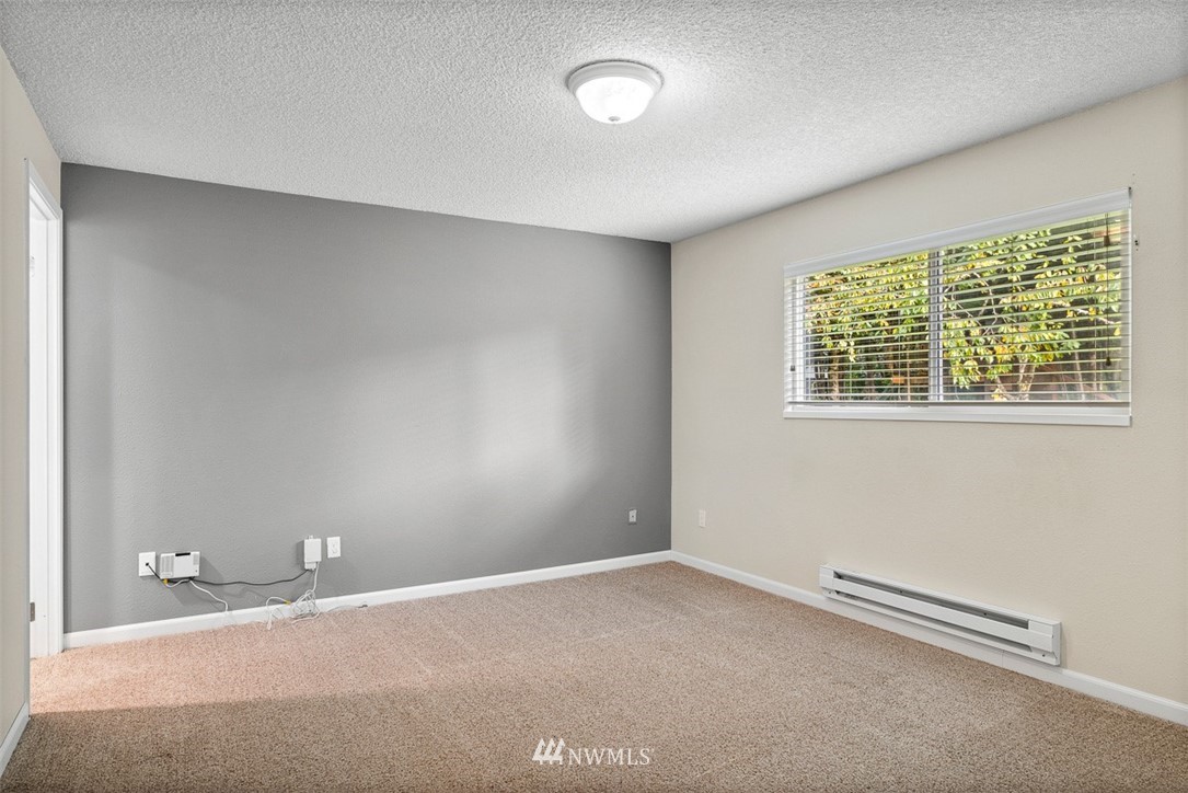 16505 23rd Avenue Southeast Bothell, WA 98012 - Photo 17 of 33 a view of an empty room with a window