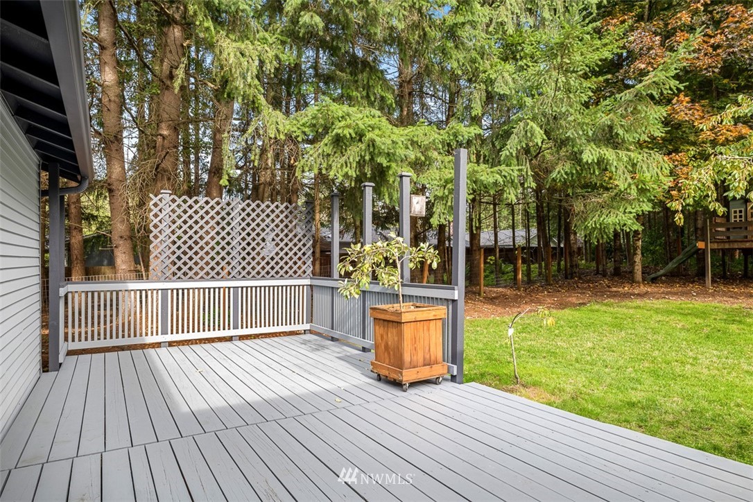 16505 23rd Avenue Southeast Bothell, WA 98012 - Photo 22 of 33 a view of outdoor space with deck and garden