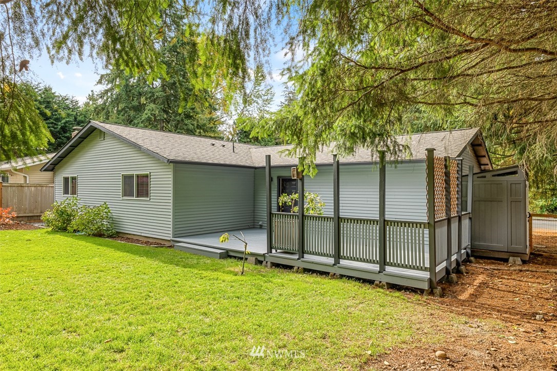 16505 23rd Avenue Southeast Bothell, WA 98012 - Photo 29 of 33 a view of backyard with a garden and tree