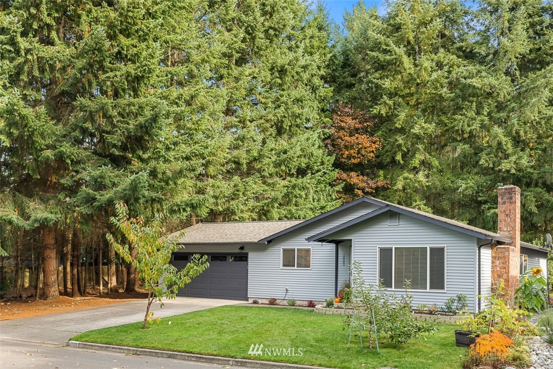 16505 23rd Avenue Southeast Bothell, WA 98012 - Photo 31 of 33 a front view of a house with garden