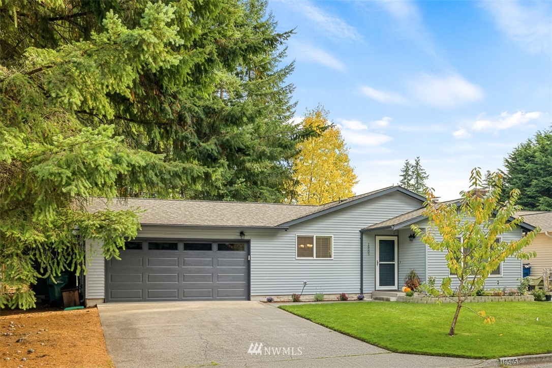 16505 23rd Avenue Southeast Bothell, WA 98012 - Photo 32 of 33 a front view of a house with a garden