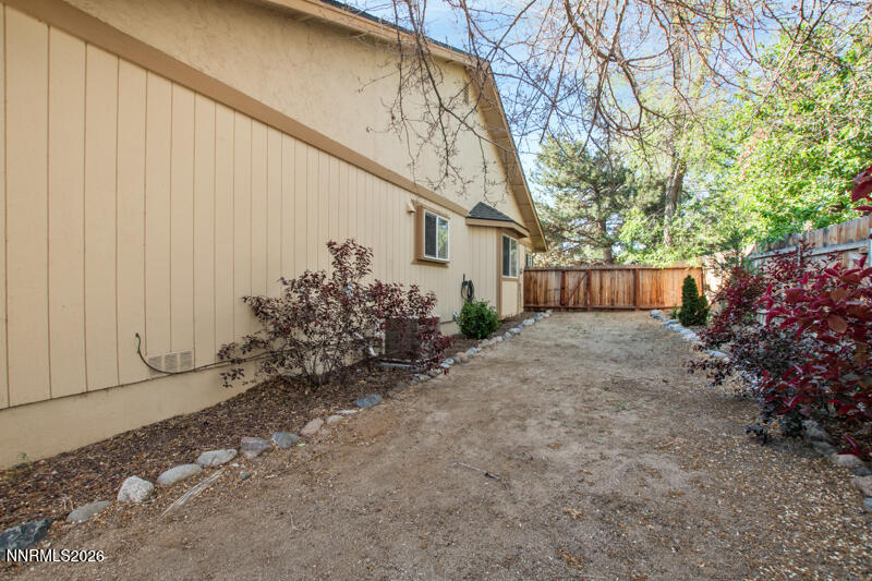675 College Drive Reno, NV 89503 - Photo 25 of 30 a view of a house with a yard and tree