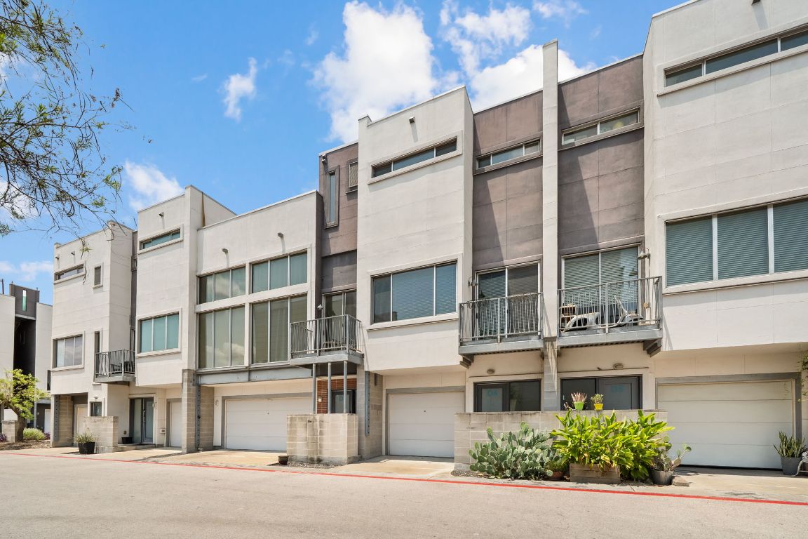 4801 South Congress Avenue, Unit D4 Austin, TX 78745 - Photo 2 of 27 a view of a building with a street