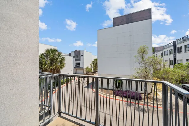 a view of balcony with furniture