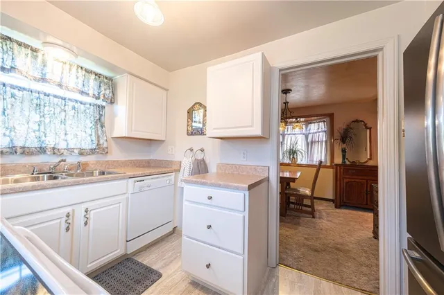 a bedroom with a bed and a television