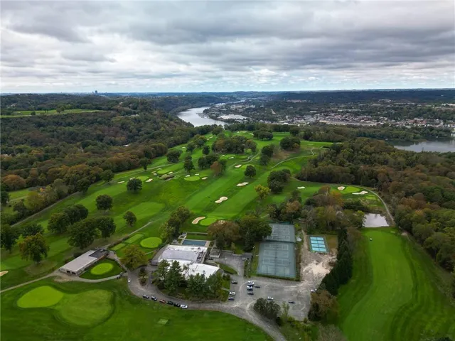 an aerial view of a city with lots of residential buildings
