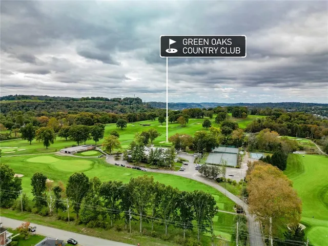 an aerial view of residential house with outdoor space