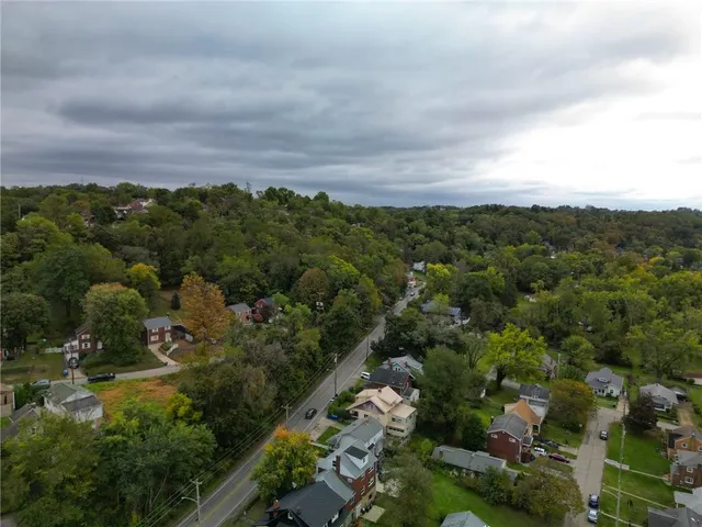 an aerial view of a city with lots of residential buildings