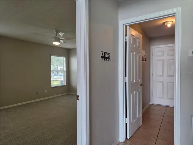 a view of a hallway with front door