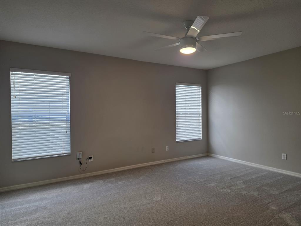 1645 Algonkin Loop Orlando, FL 32828 - Photo 15 of 37 a view of an empty room with a window