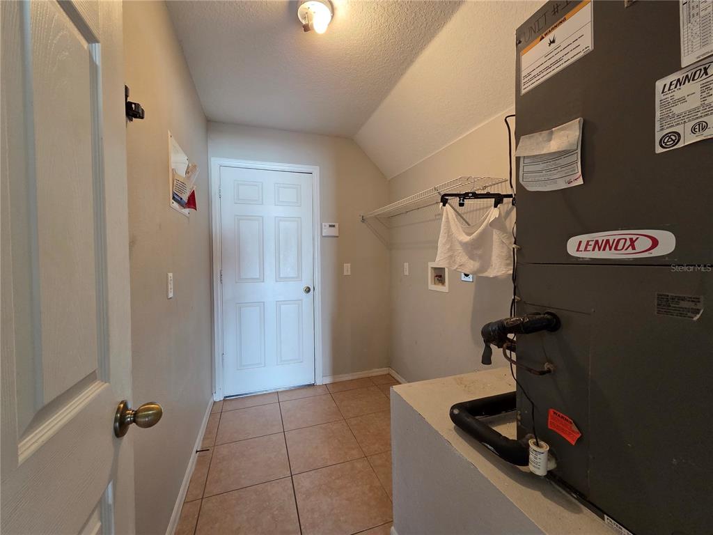 1645 Algonkin Loop Orlando, FL 32828 - Photo 20 of 37 a bathroom with a sink and a shower