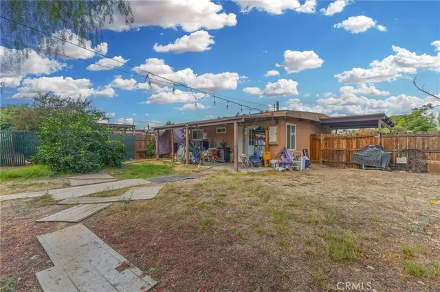 a view of a house with entertaining space