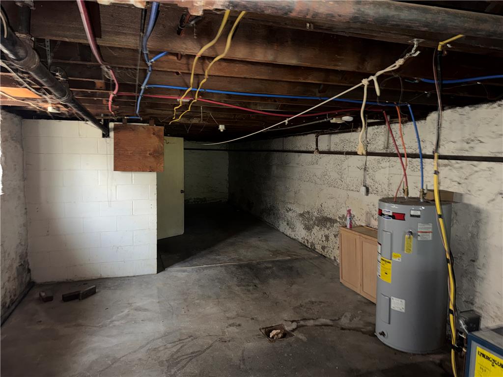 41 West Ridge Street Lansford, PA 18232 - Photo 37 of 40 A spacious, unfinished basement offers ample storage and future development potential.