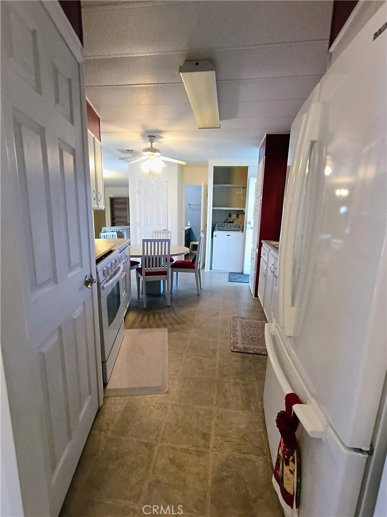 17640 Corkill Road, Unit 66 Desert Hot Springs, CA 92241 - Photo 18 of 45 View from dining room into kitchen
