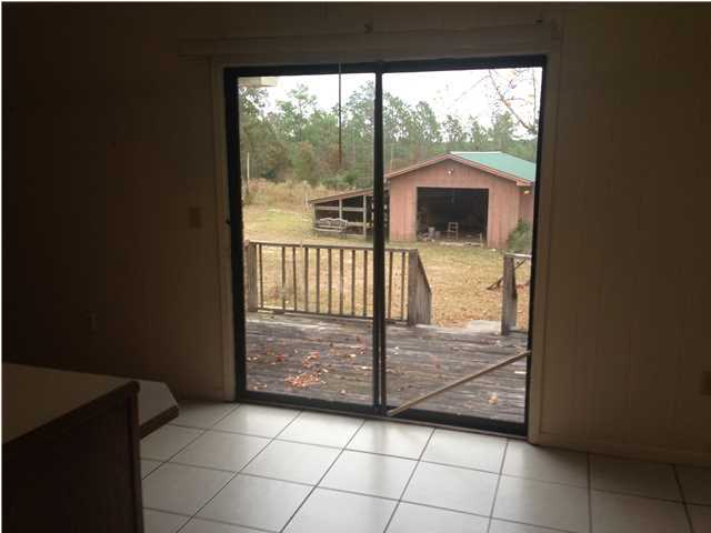 1086 Tallokas Road Crestview, FL 32536 - Photo 13 of 34 a view of a porch