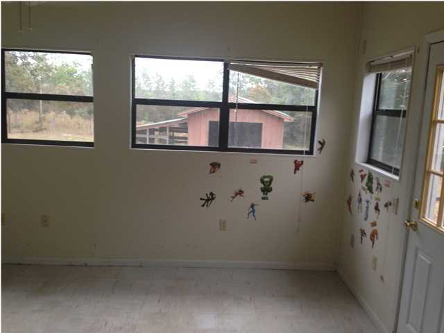 1086 Tallokas Road Crestview, FL 32536 - Photo 16 of 34 a view of room with window