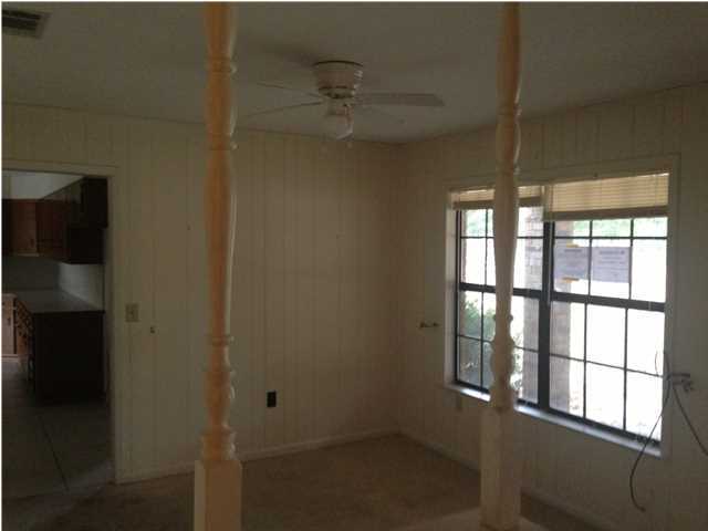 1086 Tallokas Road Crestview, FL 32536 - Photo 20 of 34 a view of empty room with a window