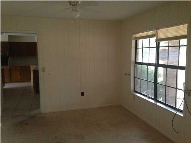 1086 Tallokas Road Crestview, FL 32536 - Photo 21 of 34 a view of an empty room with a window