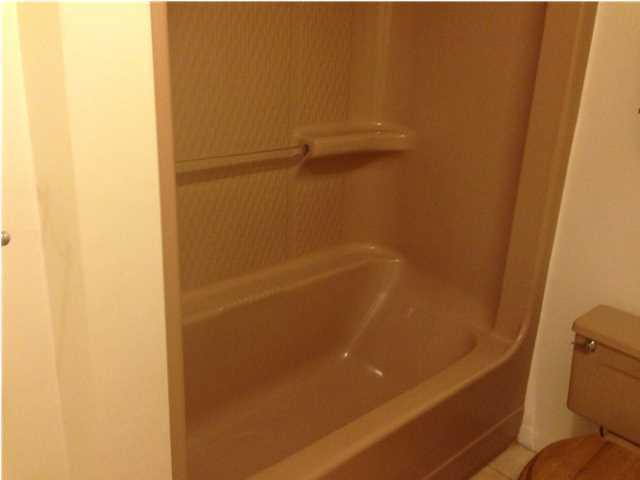 1086 Tallokas Road Crestview, FL 32536 - Photo 25 of 34 a bathroom with a shower