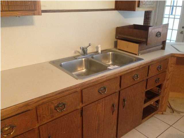 1086 Tallokas Road Crestview, FL 32536 - Photo 8 of 34 a close view of sink and tap