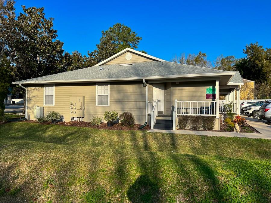 3901 Southwest 27th Street, Unit 5 Gainesville, FL 32608 - Photo 1 of 15 a view of a house with patio