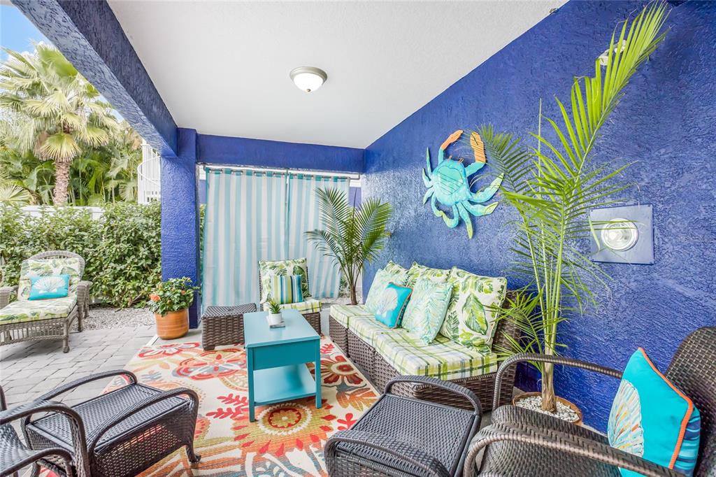 316 64th Street Holmes Beach, FL 34217 - Photo 33 of 43 a outdoor living room with furniture