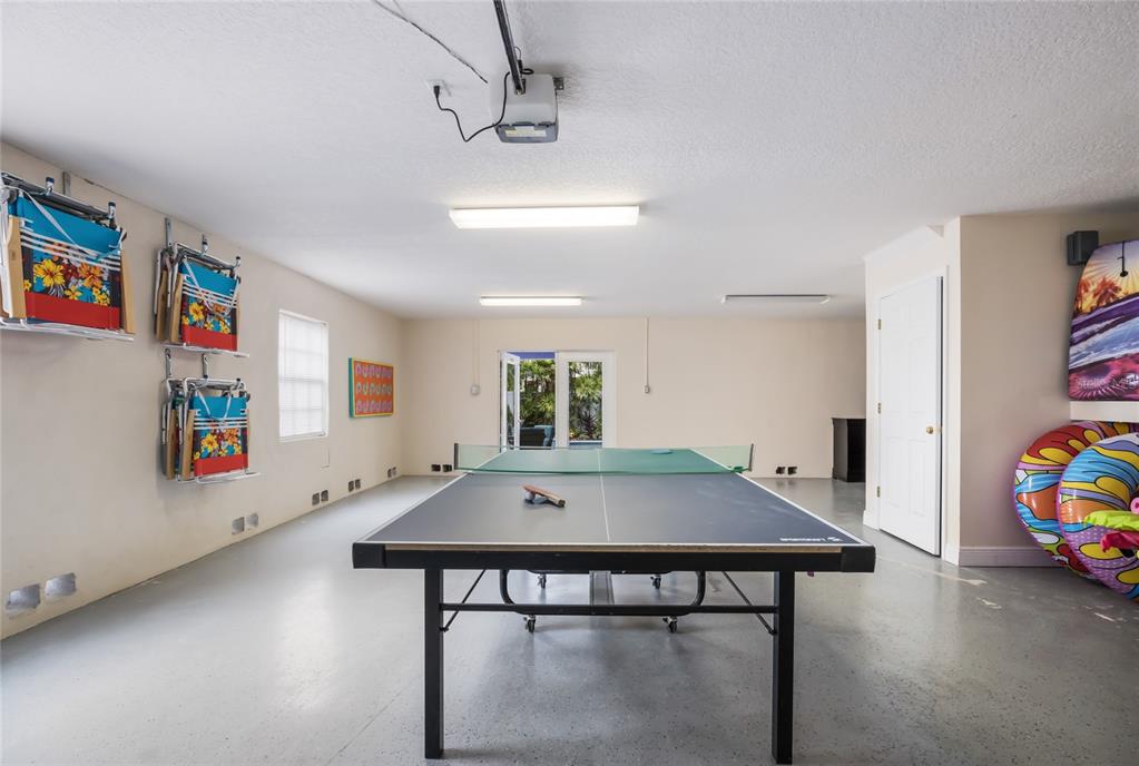 316 64th Street Holmes Beach, FL 34217 - Photo 42 of 43 a view of a room with furniture and wooden floor