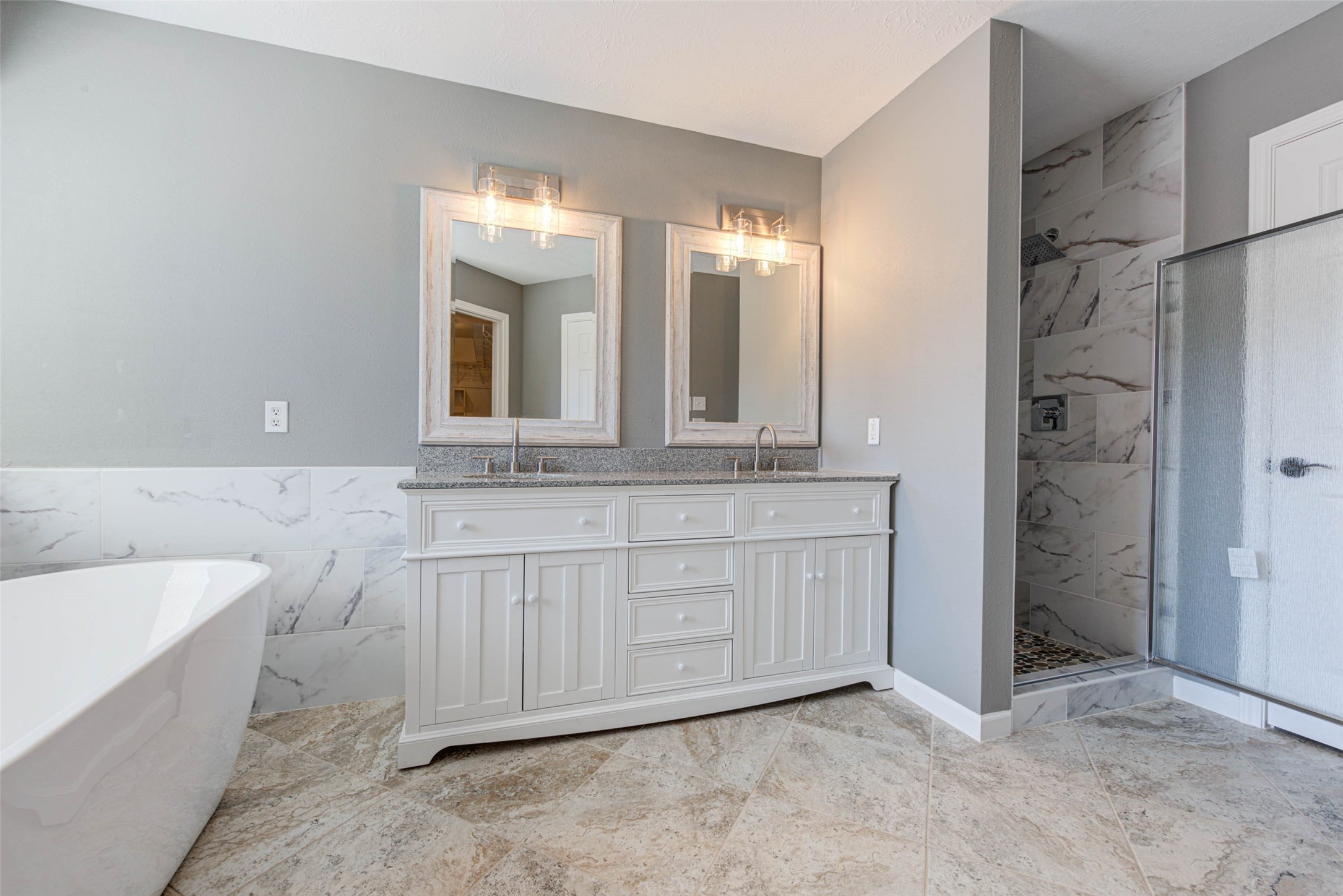17930 Seven Pines Drive Spring, TX 77379 - Photo 19 of 26 a bathroom with a sink and a mirror