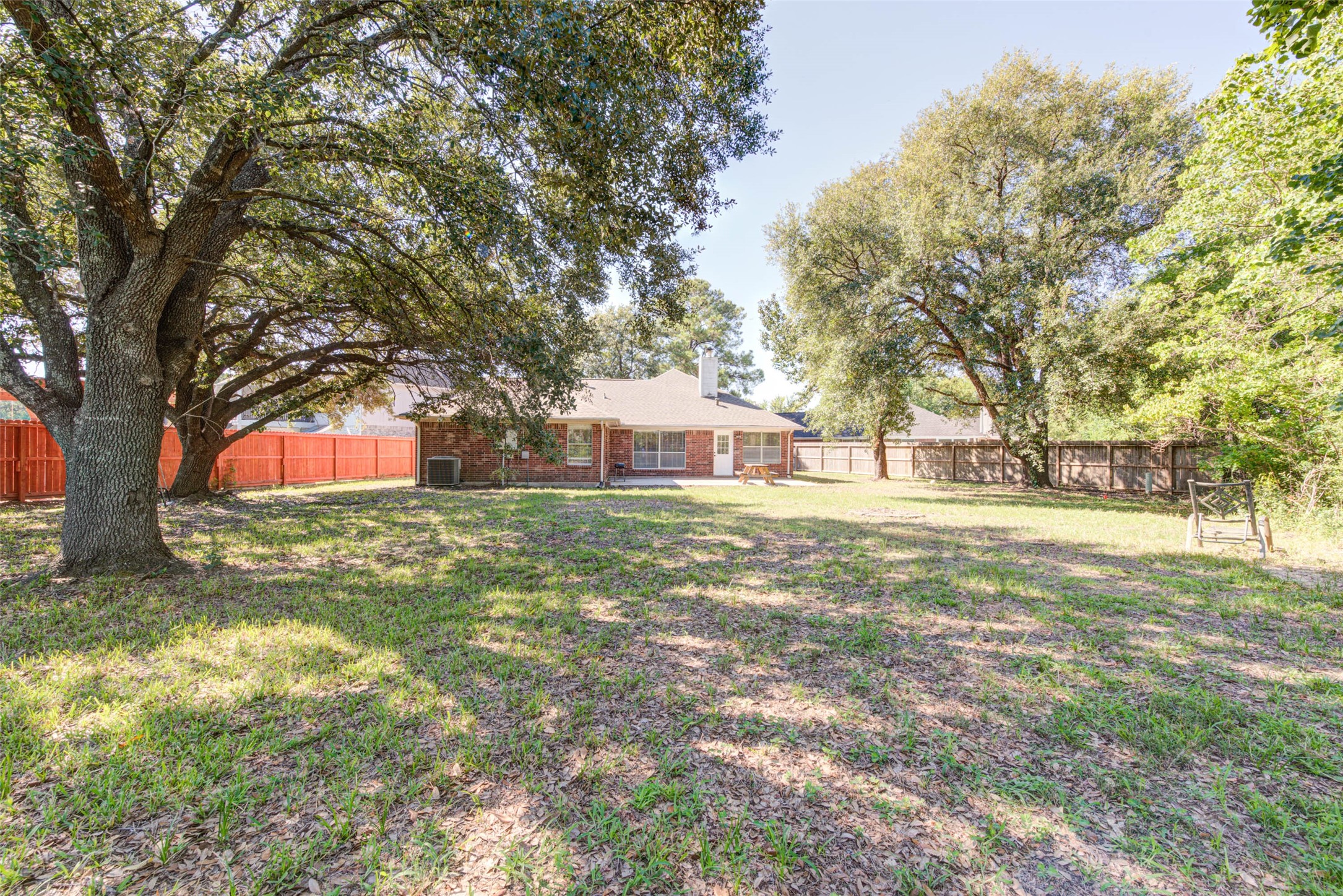 17930 Seven Pines Drive Spring, TX 77379 - Photo 25 of 26 a view of a tree in front of a house