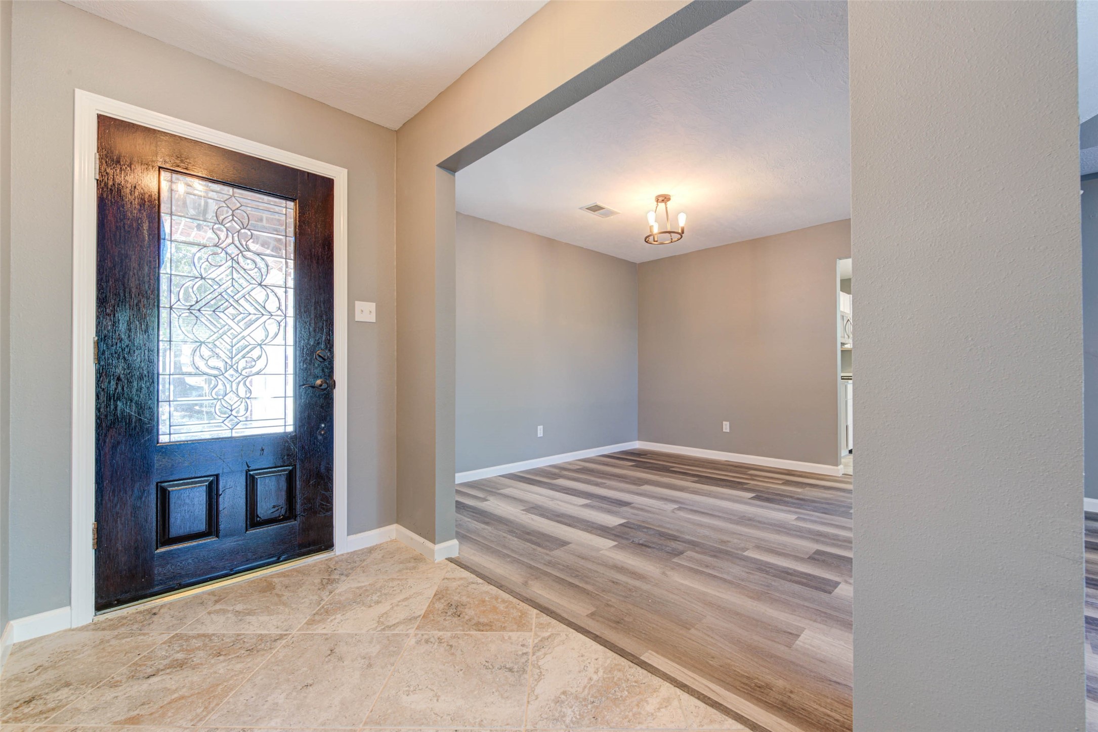 17930 Seven Pines Drive Spring, TX 77379 - Photo 5 of 26 a view of empty room with a fireplace and fan