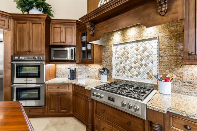 a living room with furniture a flat screen tv and a large window