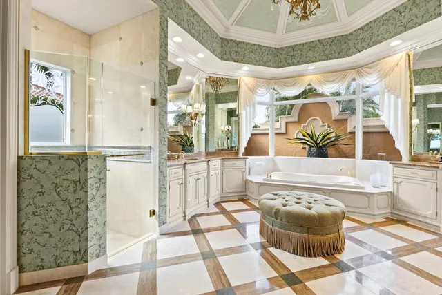 a view of a patio with a table and chairs