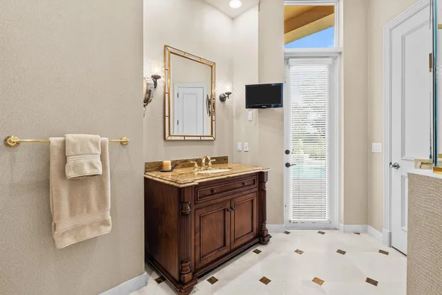 an aerial view of a house with outdoor space and street view