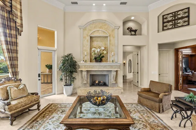 a kitchen area with granite countertop a sink stainless steel appliances and cabinets